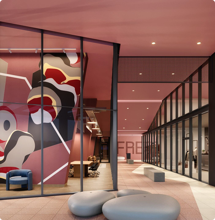 Área comum Fresta — espaço interior com zona de estar e mural